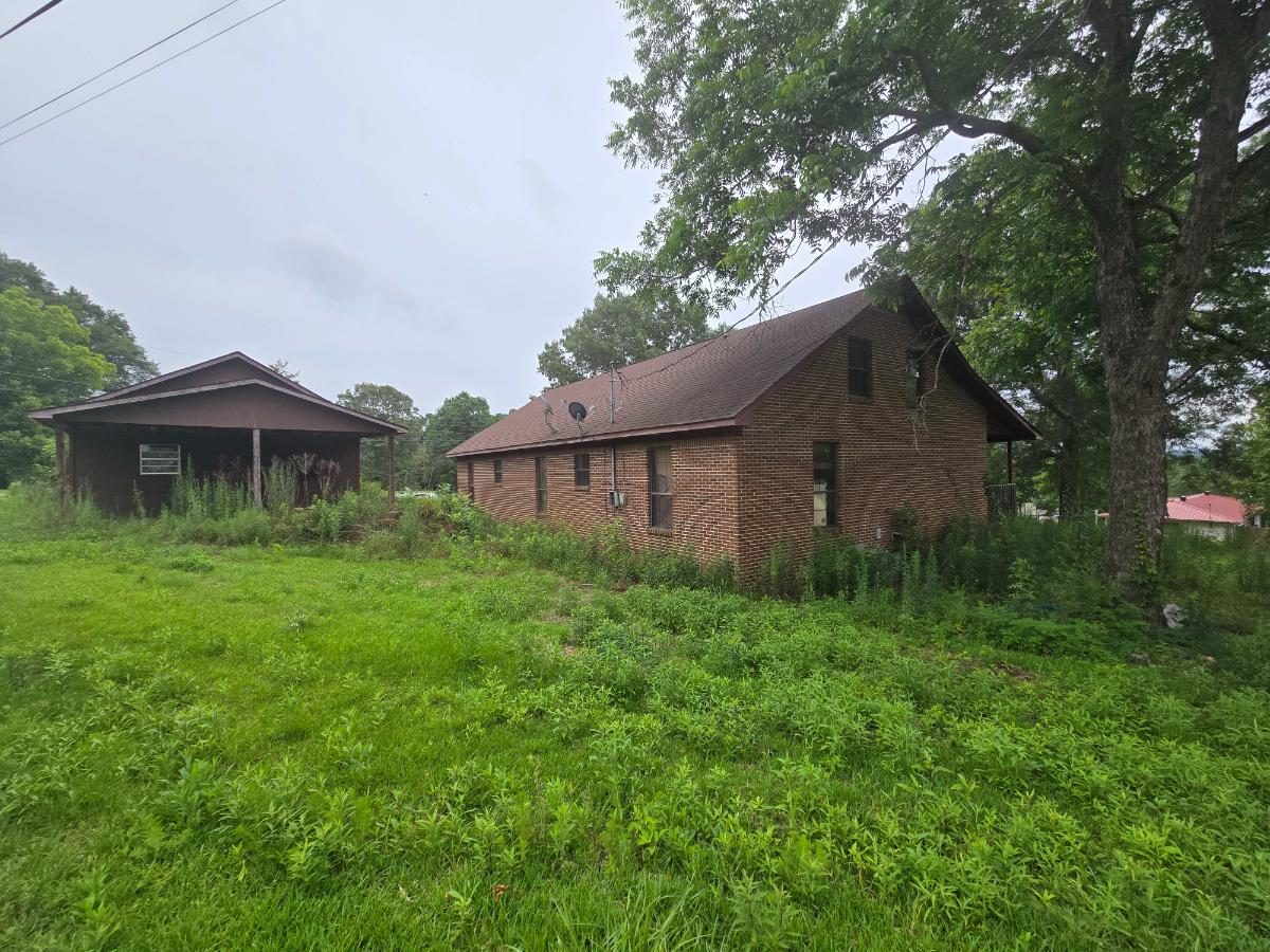 405 Armstrong Dr — Hayden brick home with detached shop